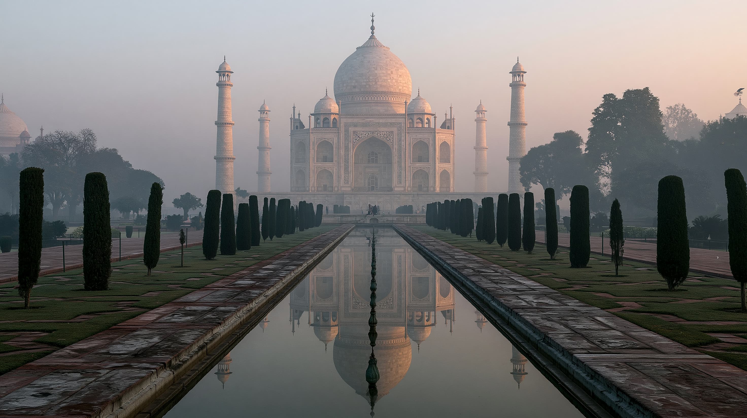Taj Mahal at sunrise reflected in the water channel Agra India - India entry requirements and onward ticket guide 2026